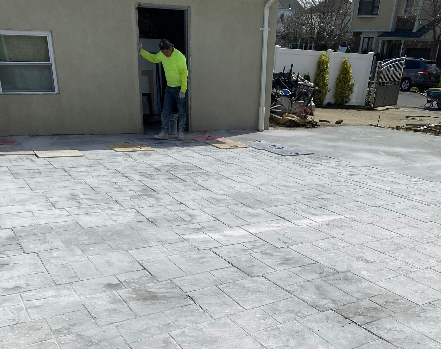 Stamped concrete surface with decorative stone-style patterns in Brooklyn.