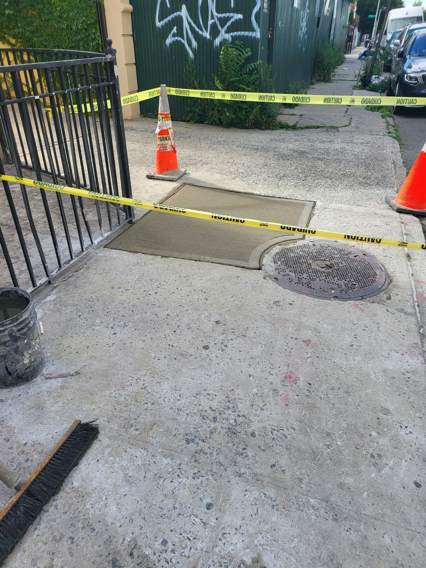 Workers performing concrete construction services such as driveways, patios, sidewalks, slabs, foundations, repairs, and leveling in New Rochelle, NY.